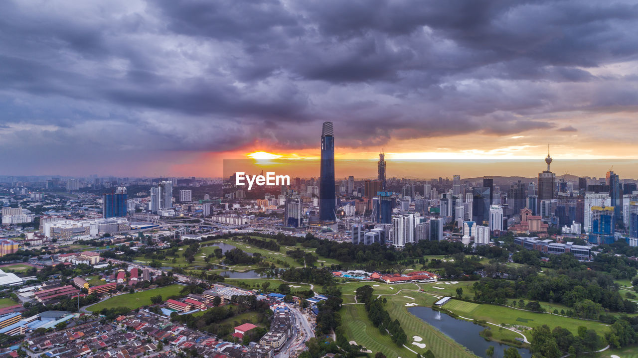 AERIAL VIEW OF CITY BUILDINGS DURING SUNSET