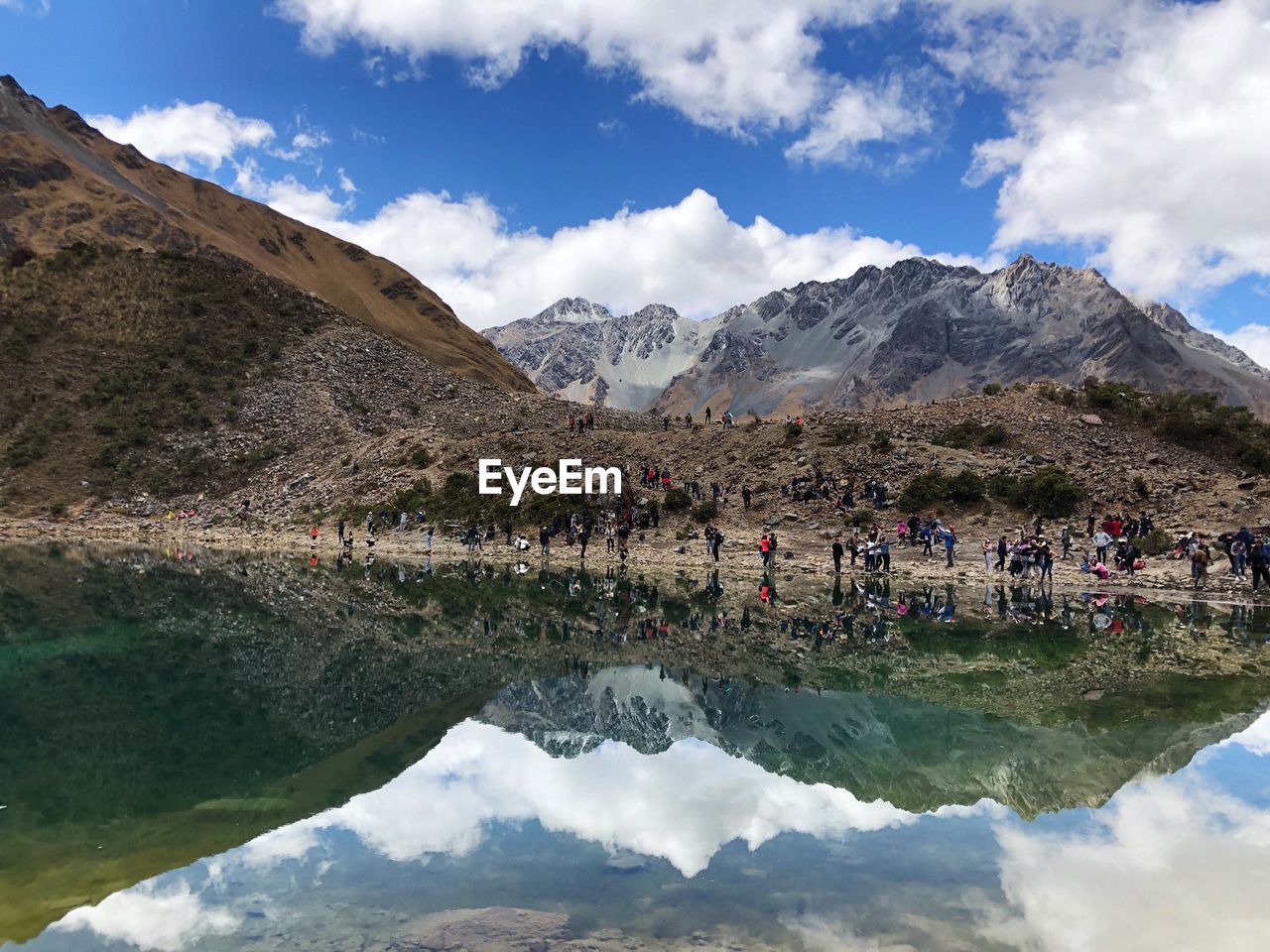 Reflection of mountains in lake against sky