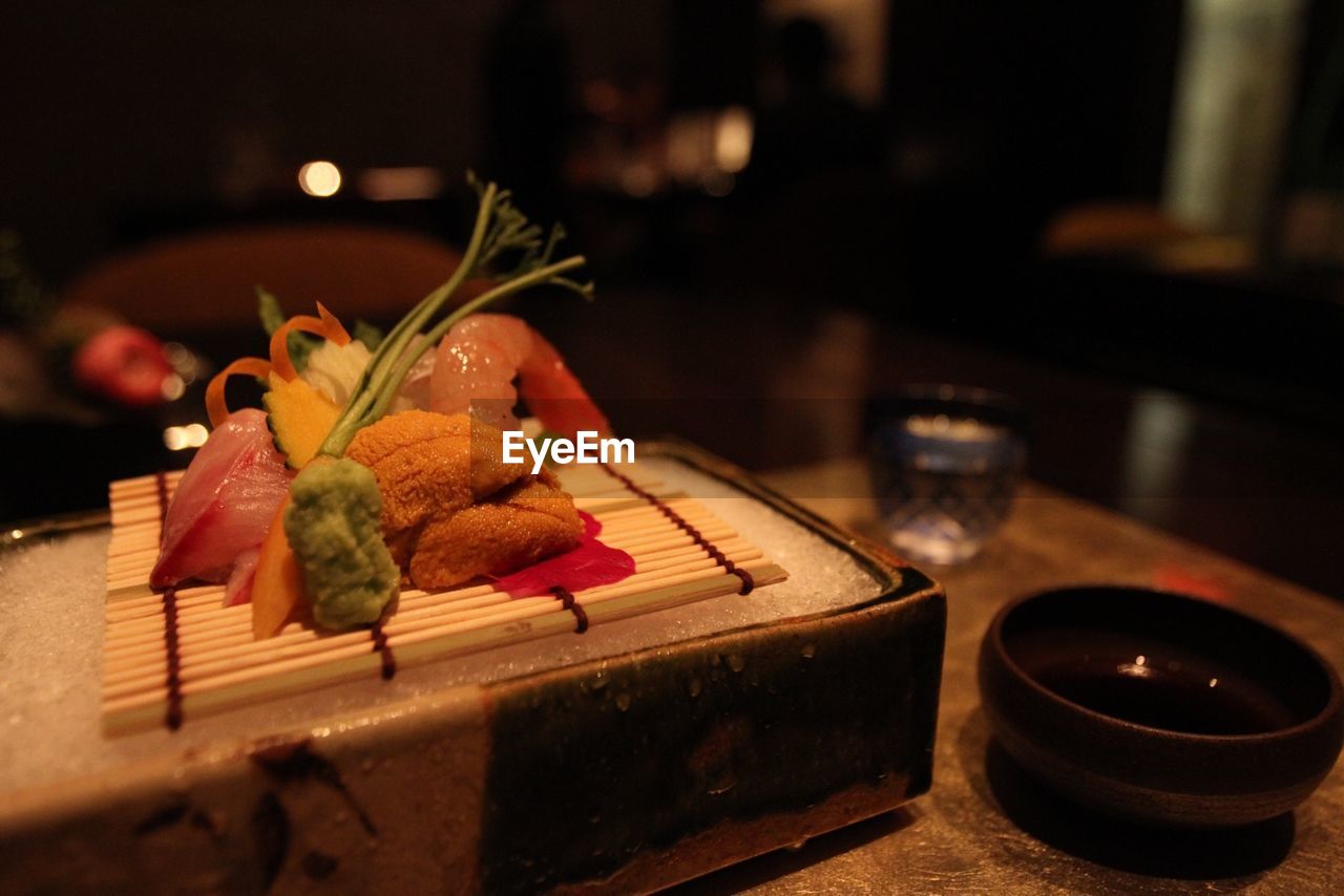 CLOSE-UP OF FOOD ON TABLE