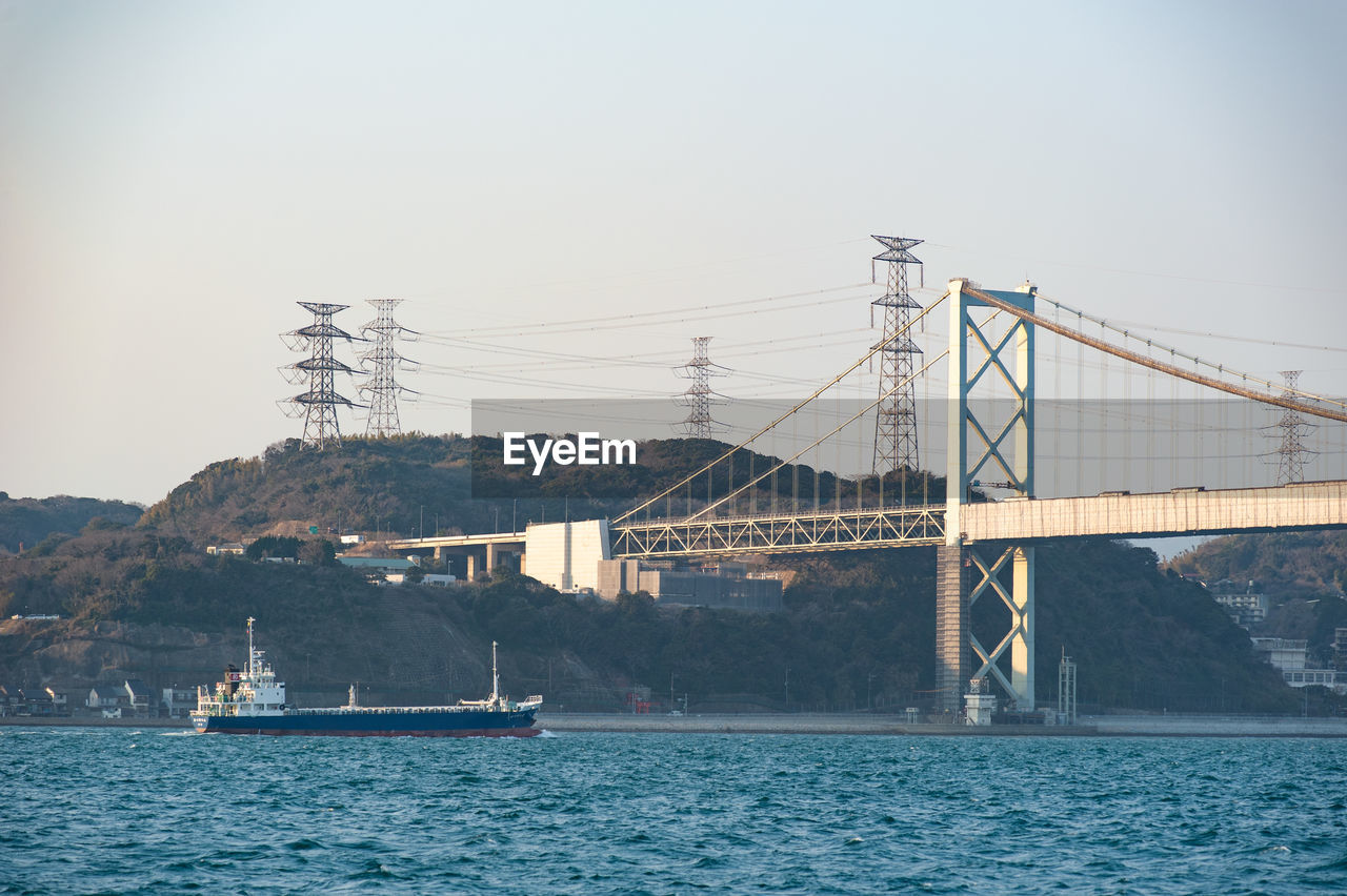 Cargo ship at kanmon bridge