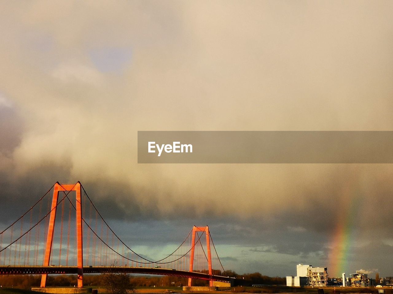 VIEW OF SUSPENSION BRIDGE IN CITY