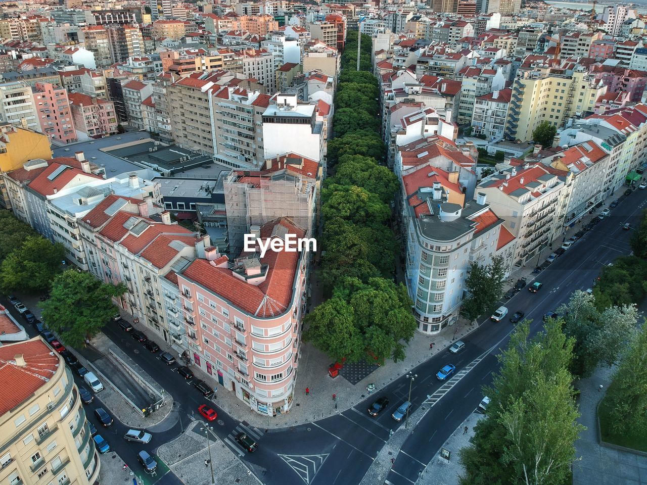 High angle view of street amidst buildings in city