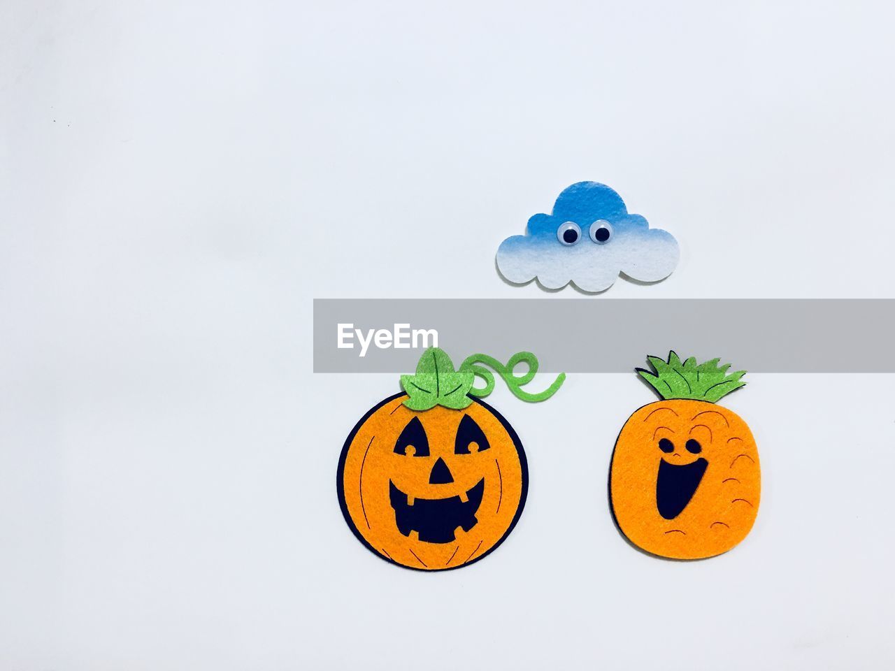 View of halloween pumpkins against white background