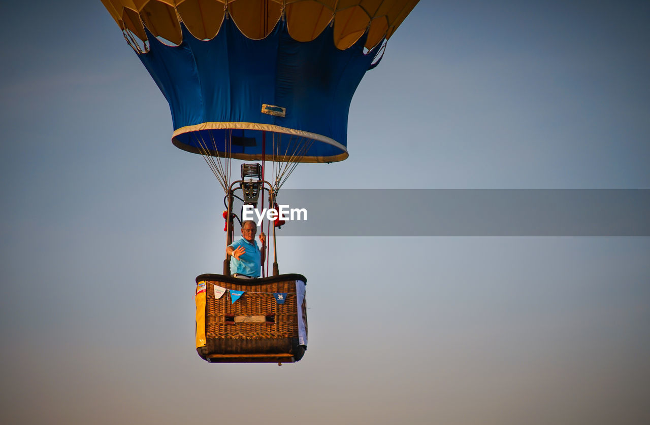 LOW ANGLE VIEW OF HOT AIR BALLOON