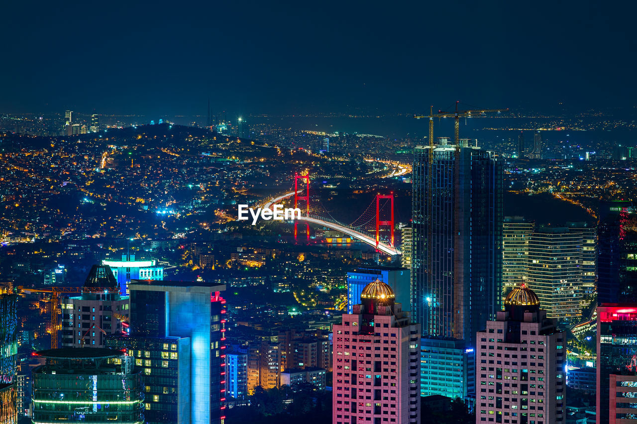 High angle view of bosphorus bridge lit up at night