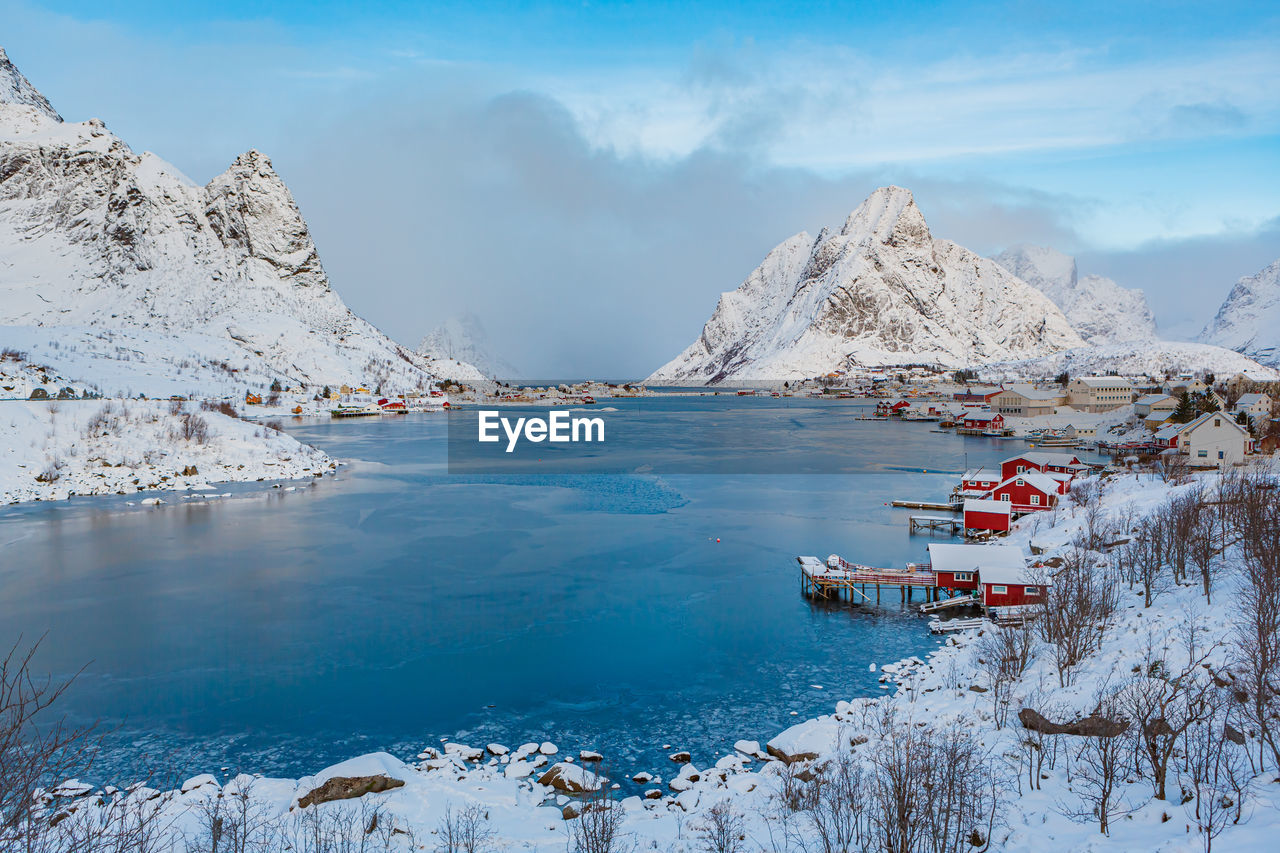 SCENIC VIEW OF SNOWCAPPED MOUNTAIN AGAINST SKY DURING WINTER