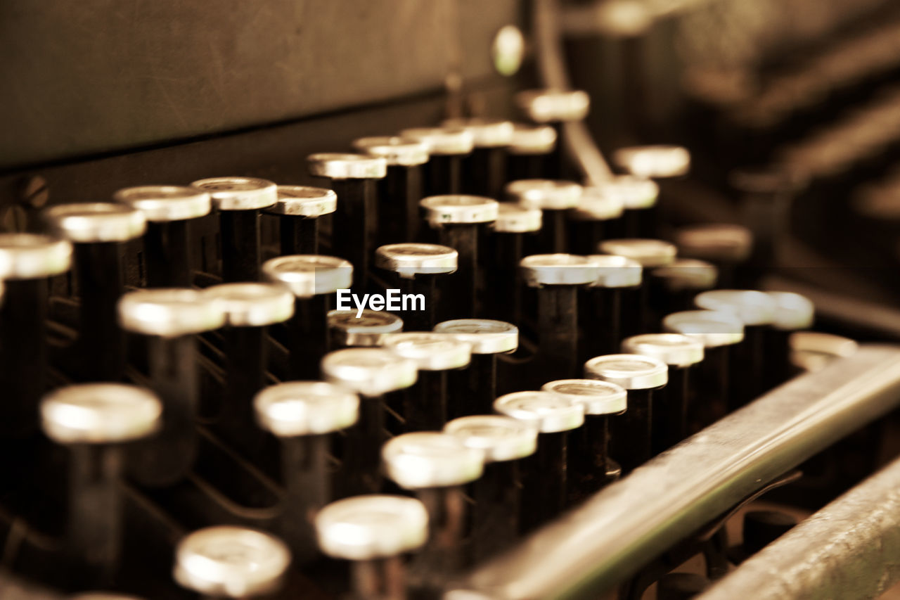 Old typewriter in antique photography vintage simulated, grunge photo.