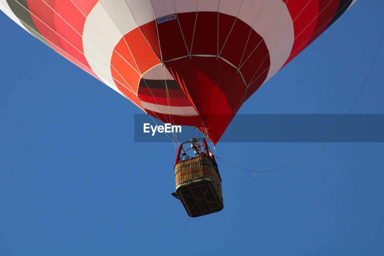 LOW ANGLE VIEW OF HOT AIR BALLOON