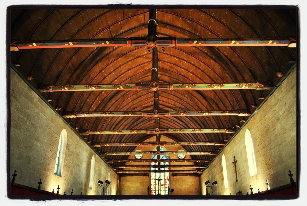 Low angle view of church ceiling