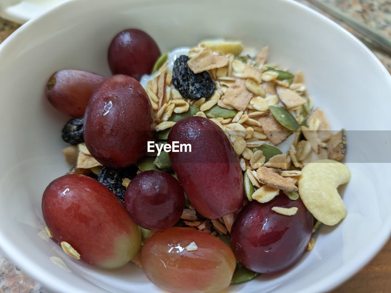 food and drink, food, healthy eating, fruit, meal, wellbeing, freshness, breakfast, plant, dish, produce, bowl, no people, plate, indoors, nut - food, nut, still life, close-up, cuisine, grape, dried fruit, high angle view, almond