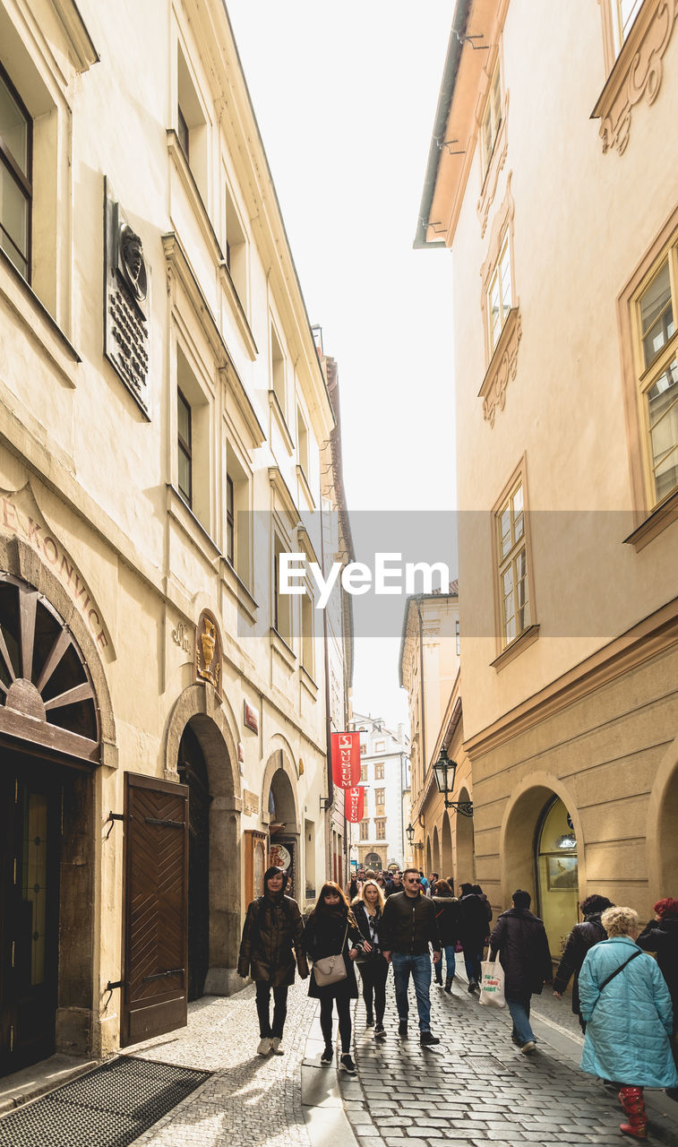 PEOPLE WALKING ON A CITY