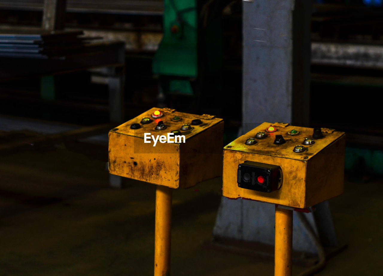 Close-up of old control panels in factory