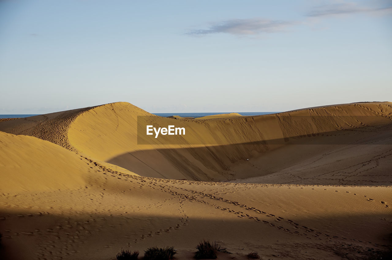 Scenic view of desert against sky