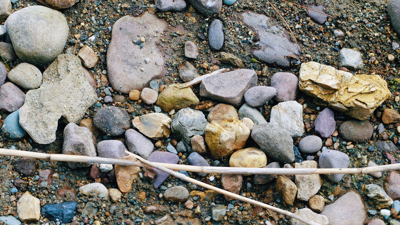 Close-up of pebbles on beach