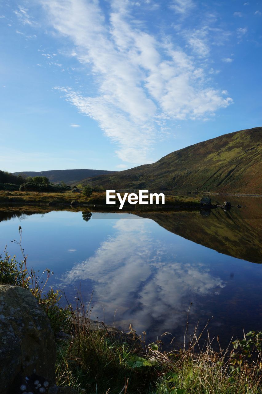 Beautiful view of sky and mountain reflected in lake