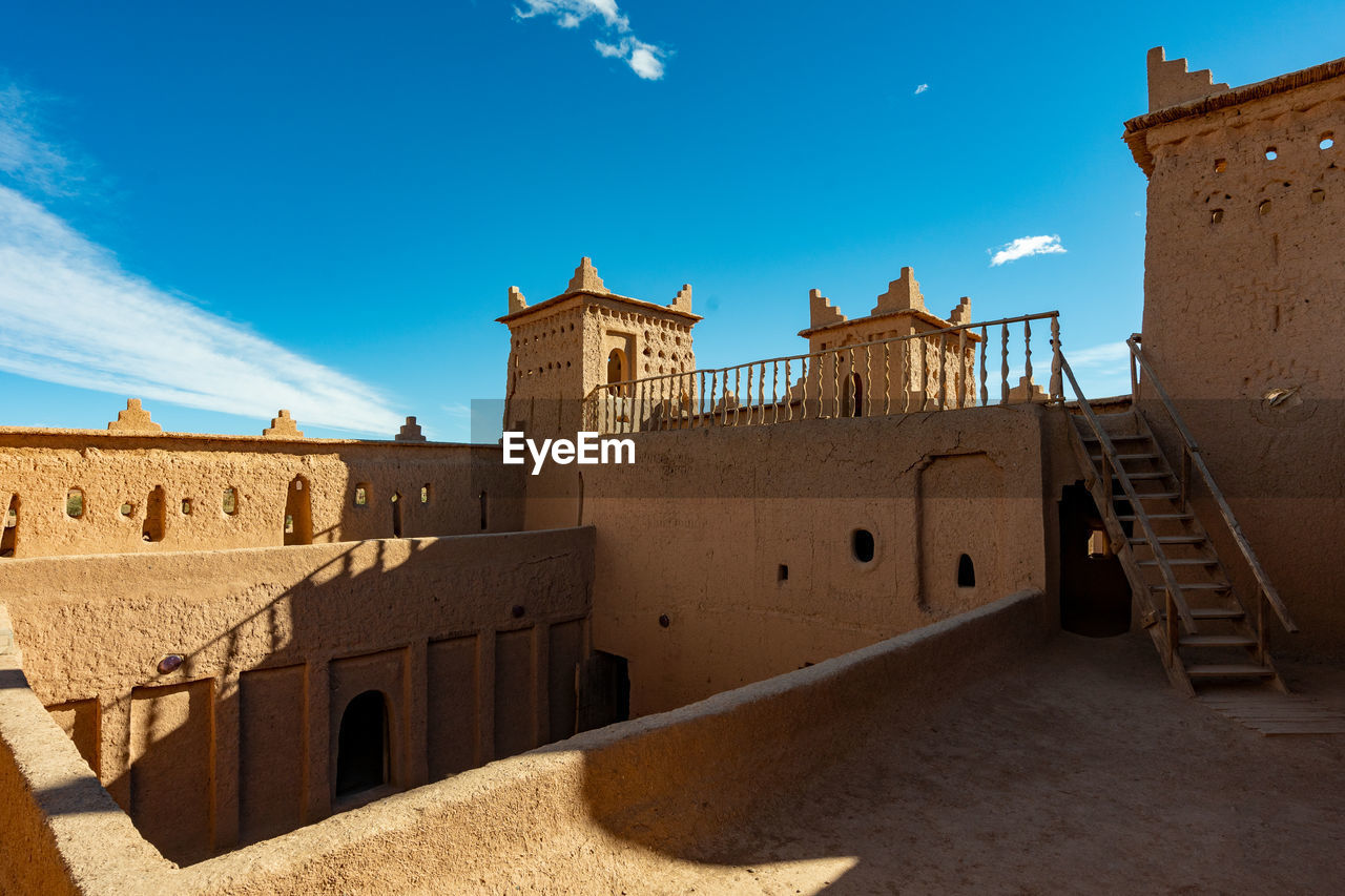 view of historic building against blue sky