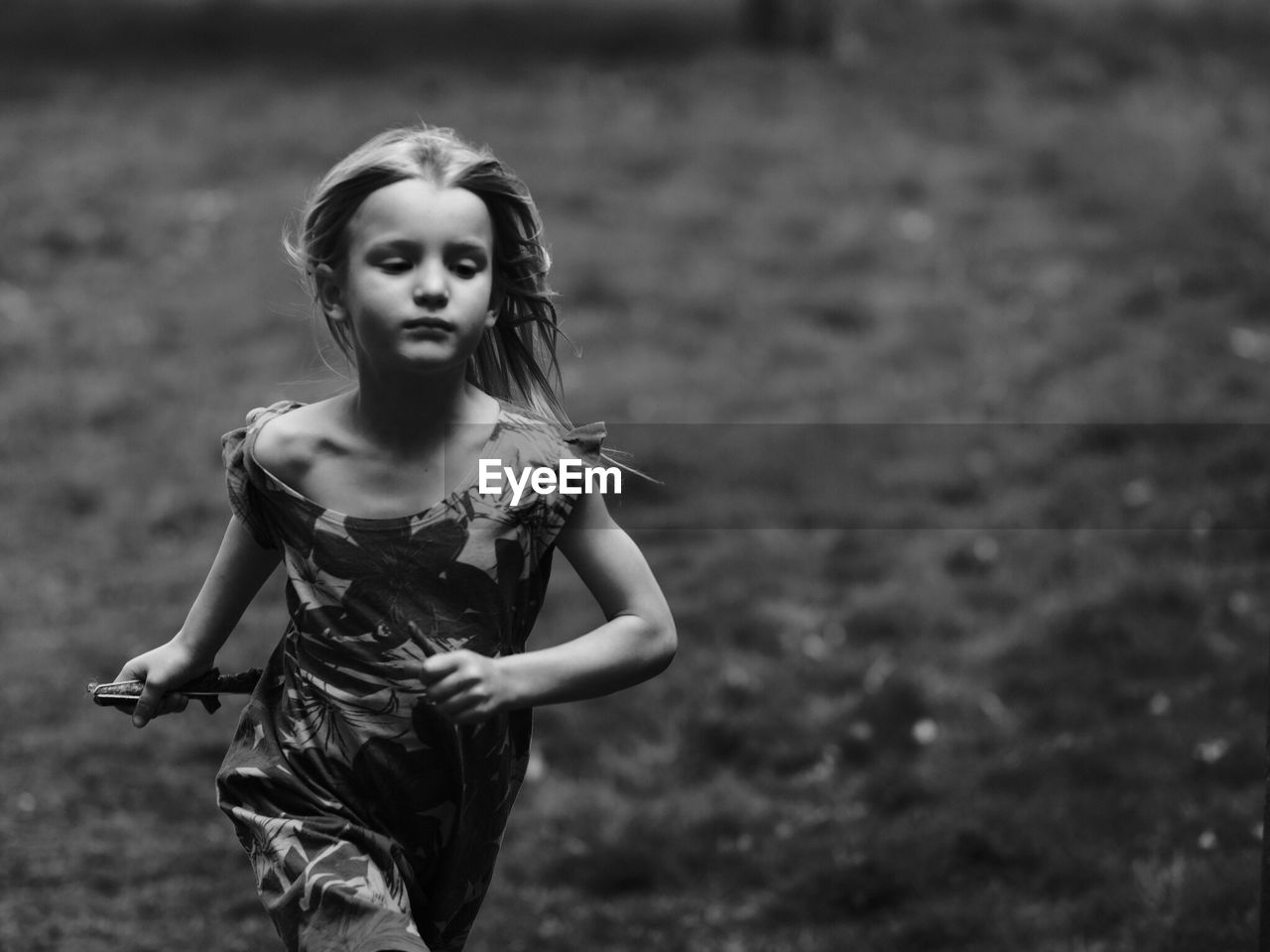 Girl running on field