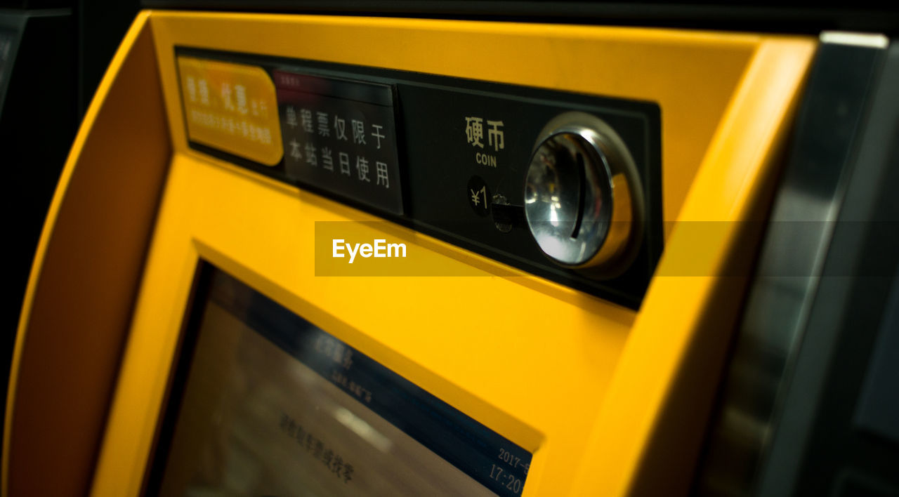 CLOSE-UP OF YELLOW TEXT