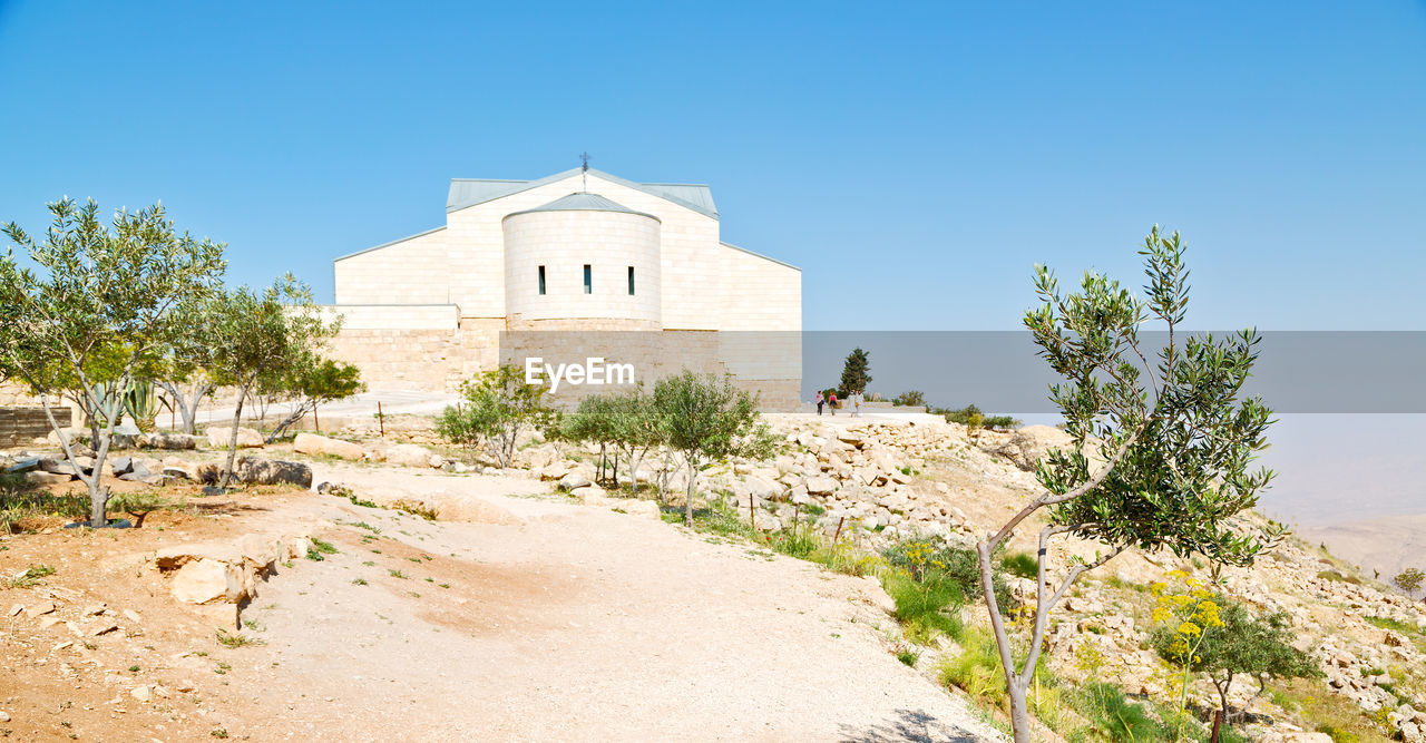 VIEW OF TEMPLE AGAINST BUILDING