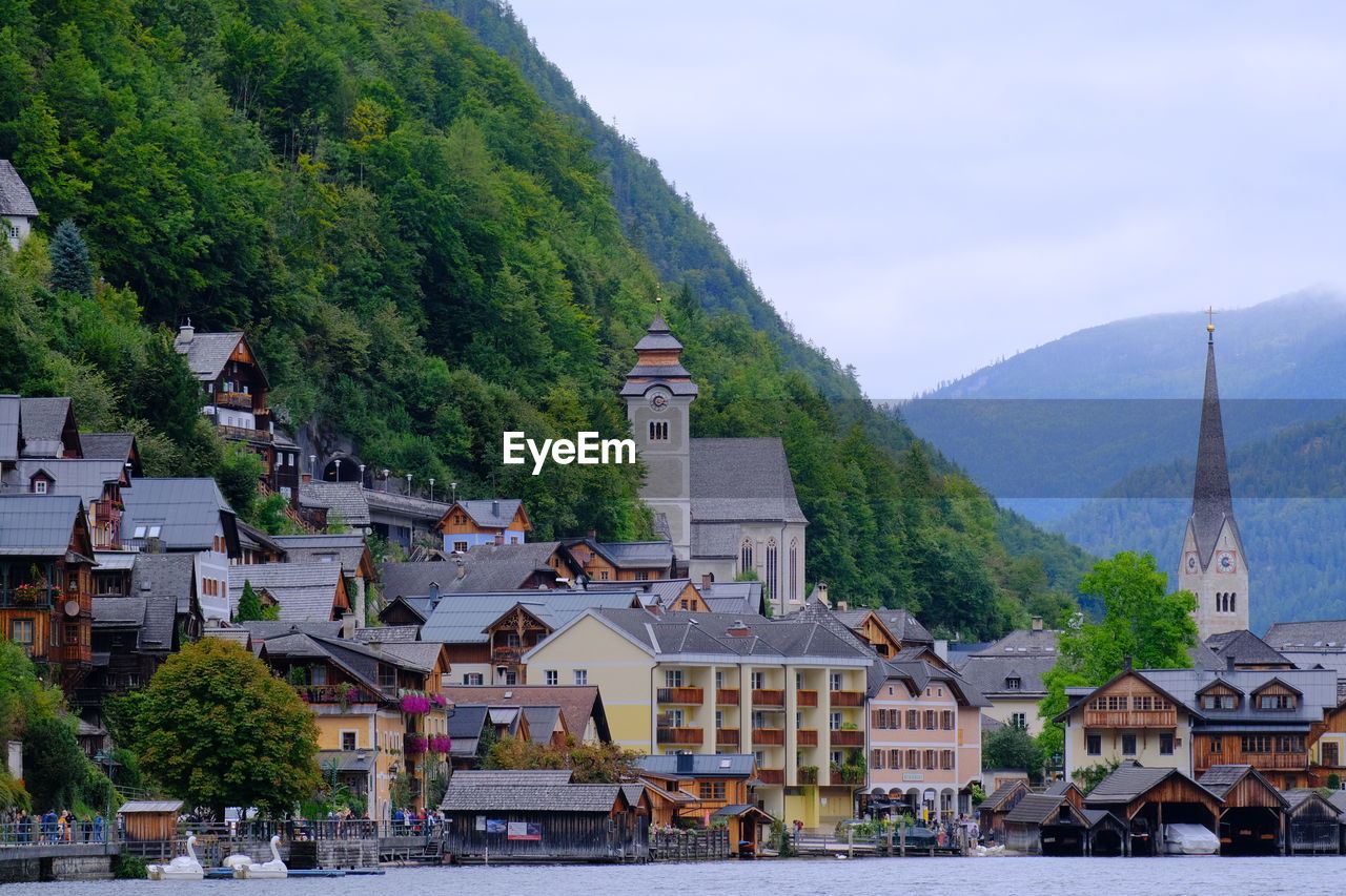 Scenic view of lake against sky at hallstat, austria