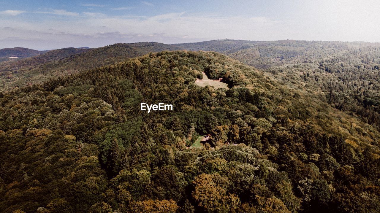 High angle view of trees and mountains against sky