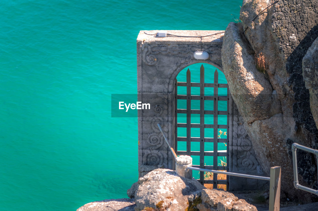 View of rock in sea
