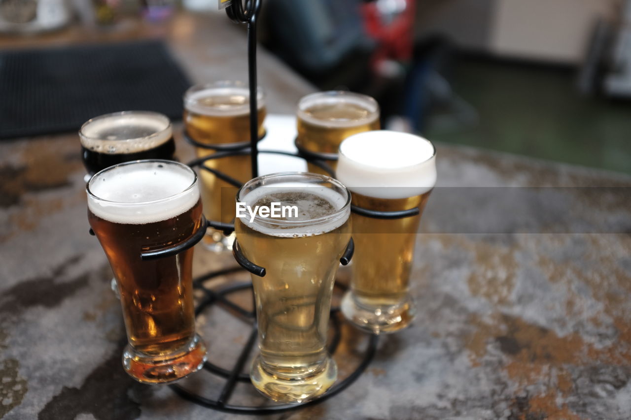 Close-up of beer glass on table