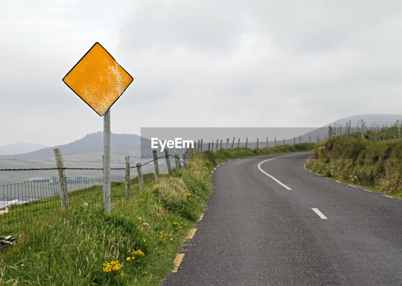 Empty yellow road sign with copy space