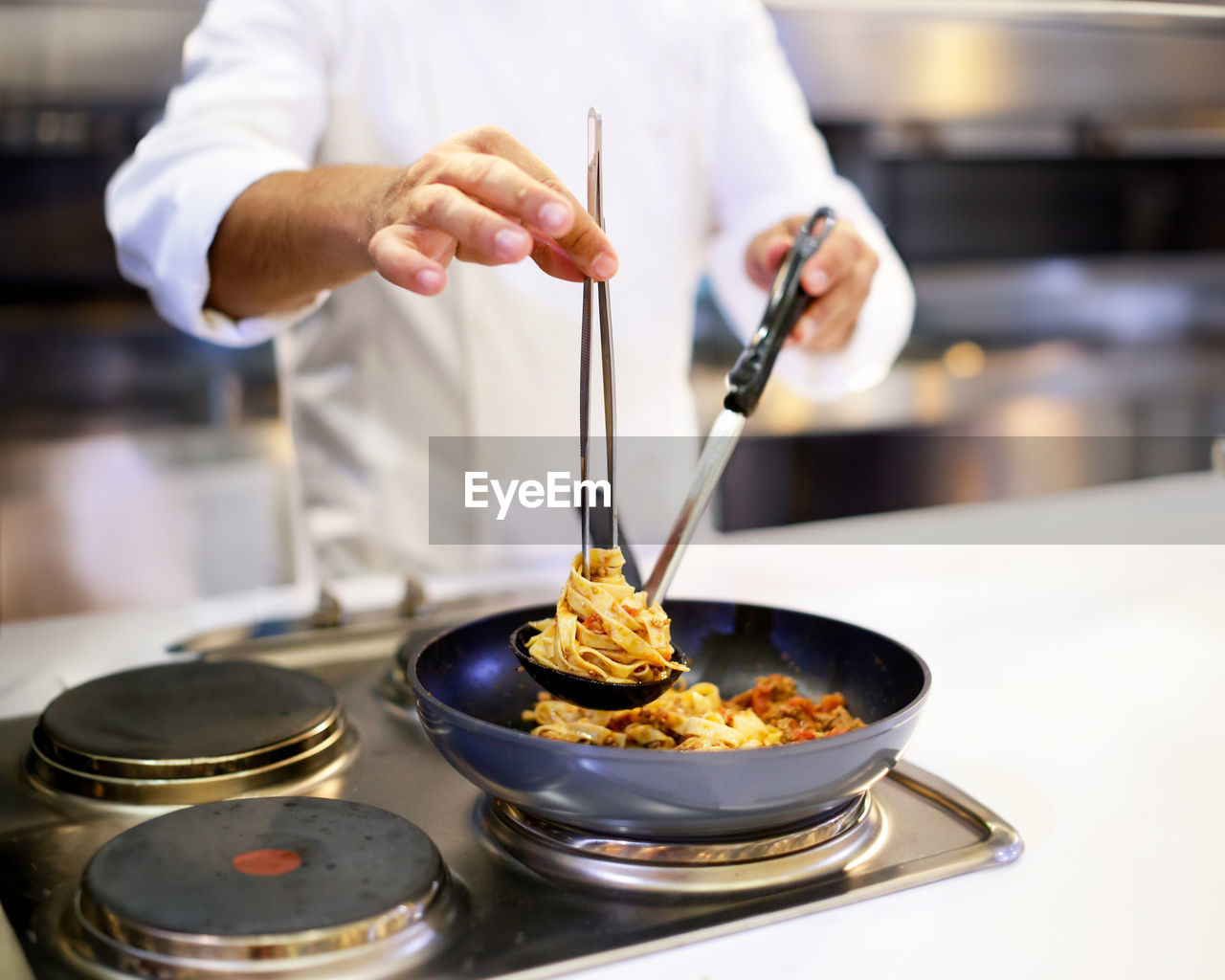 midsection of man preparing food on table