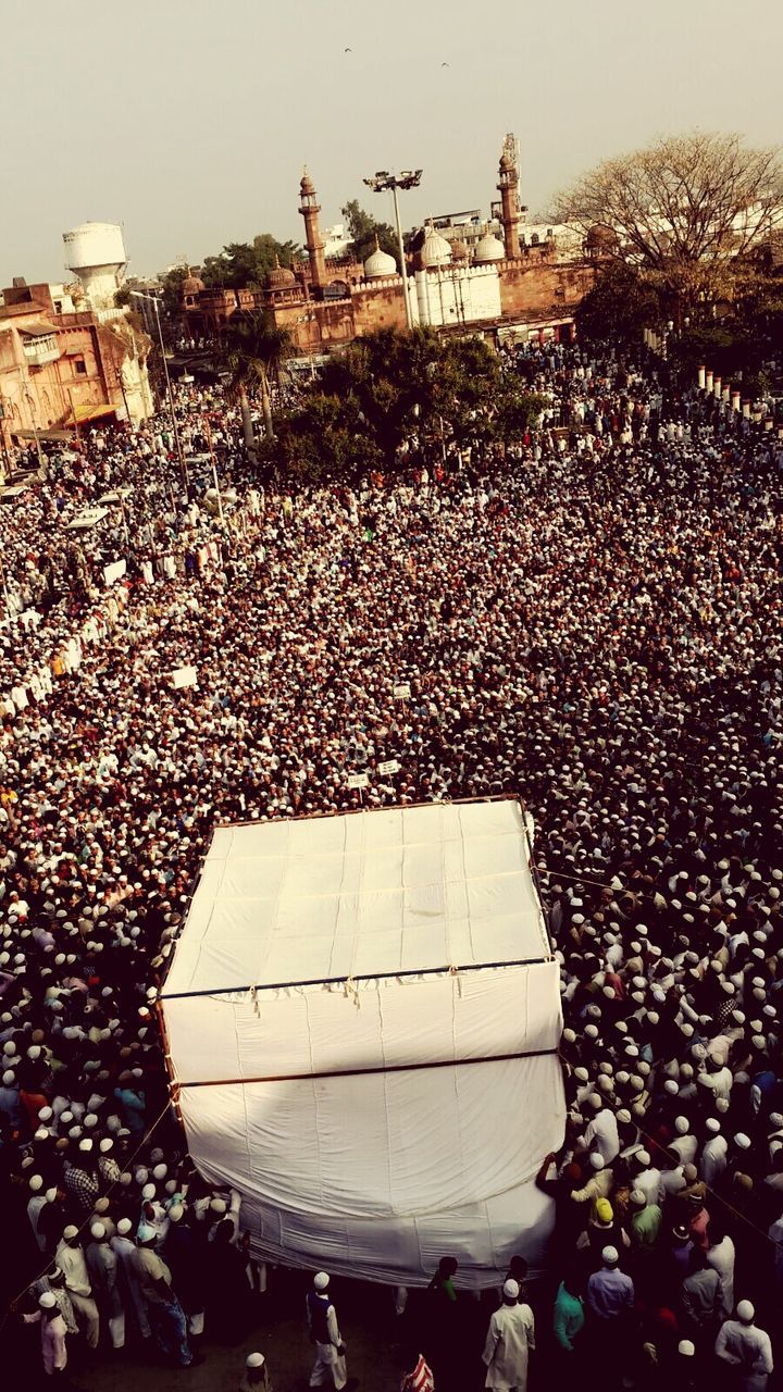 High angle view of crowd protesting at moti mosque