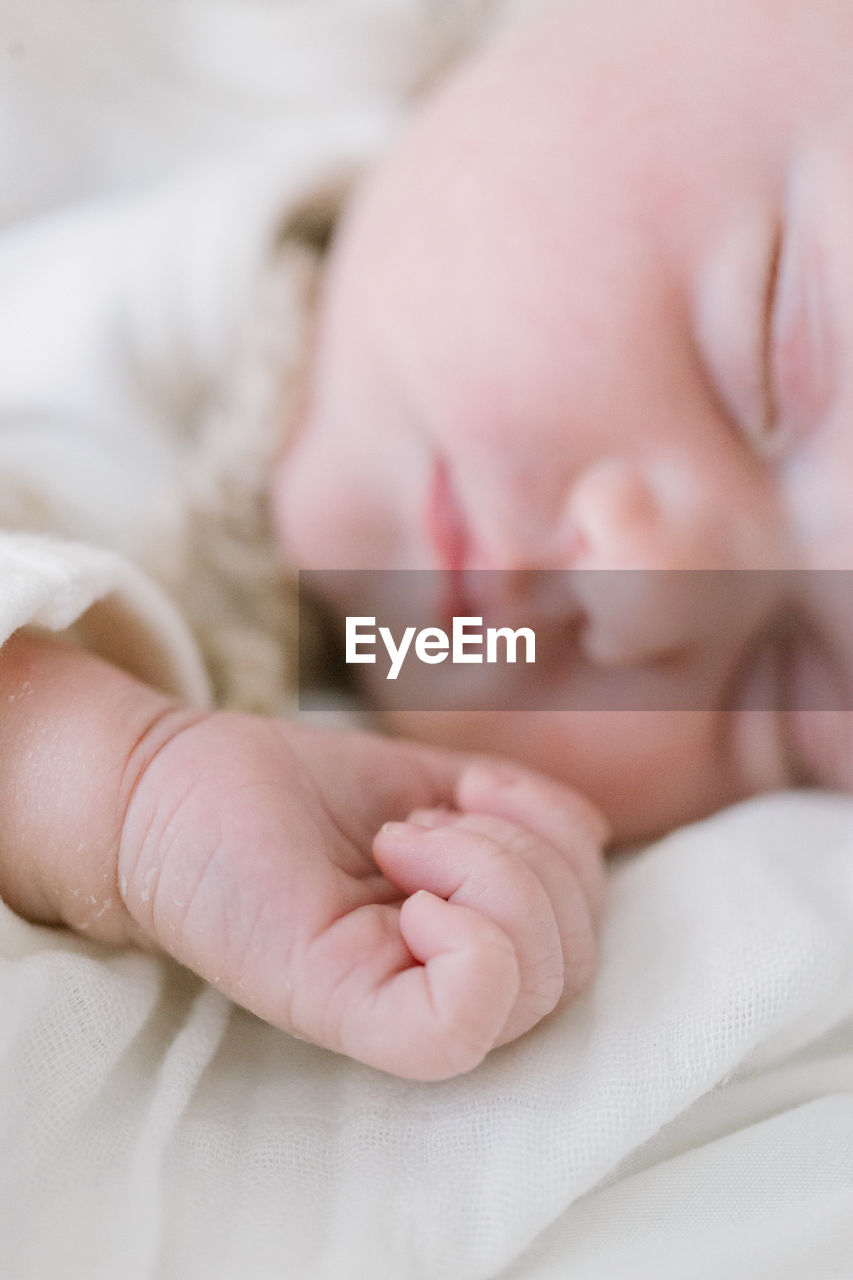 Closeup of a sleeping newborn's hand