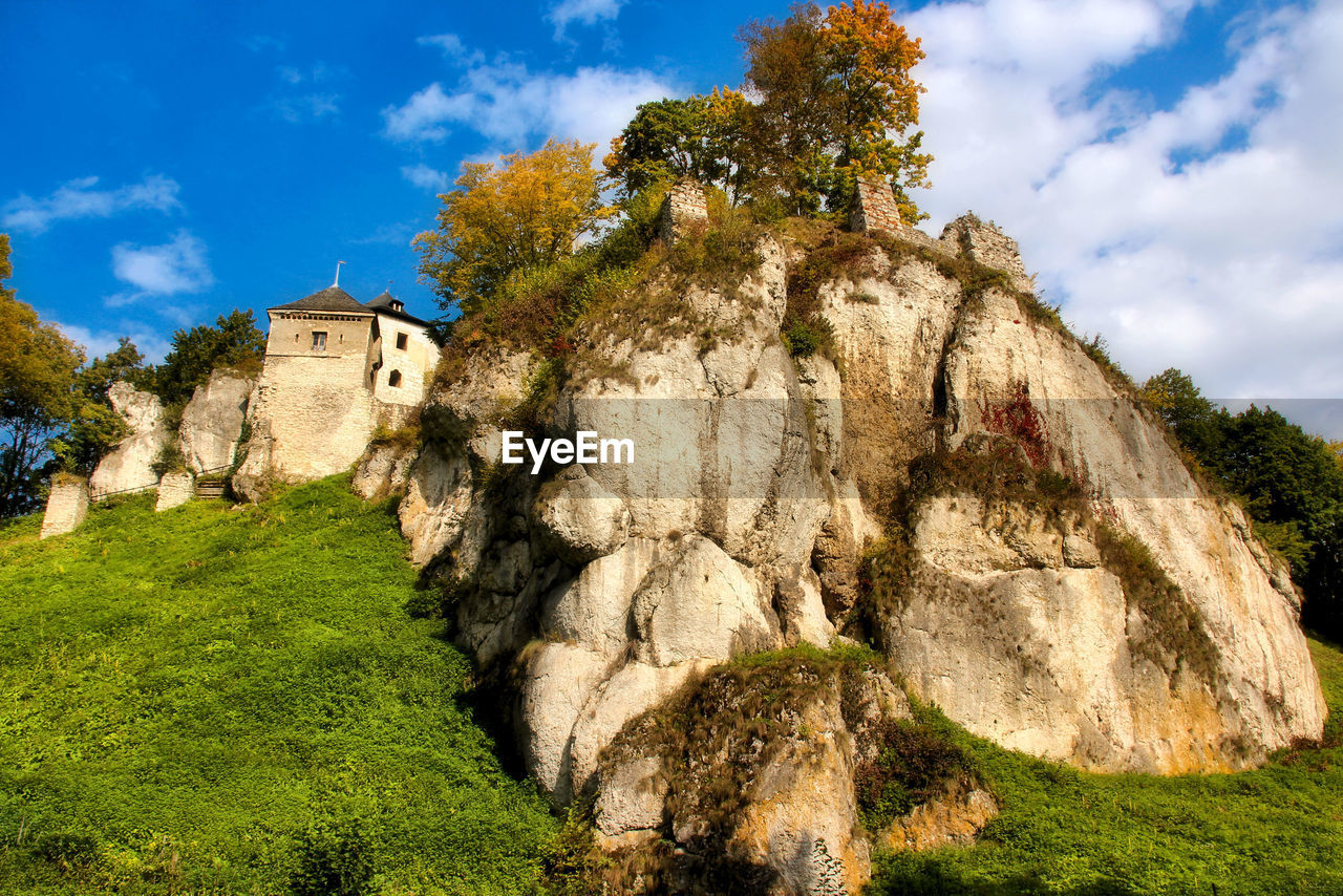 LOW ANGLE VIEW OF STONE BUILDING