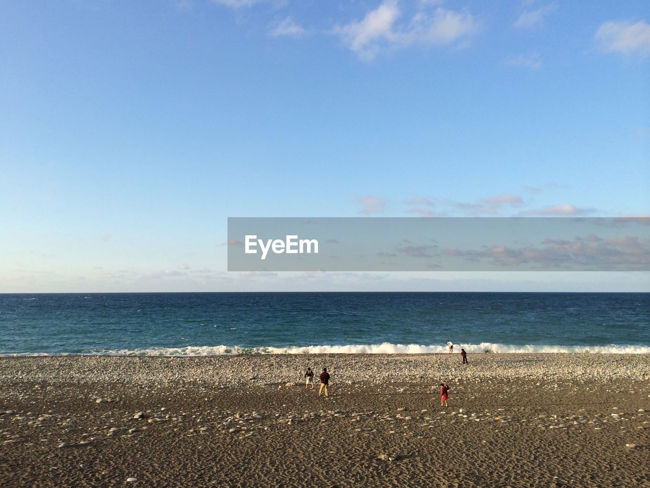 Scenic view of beach and sea against sky