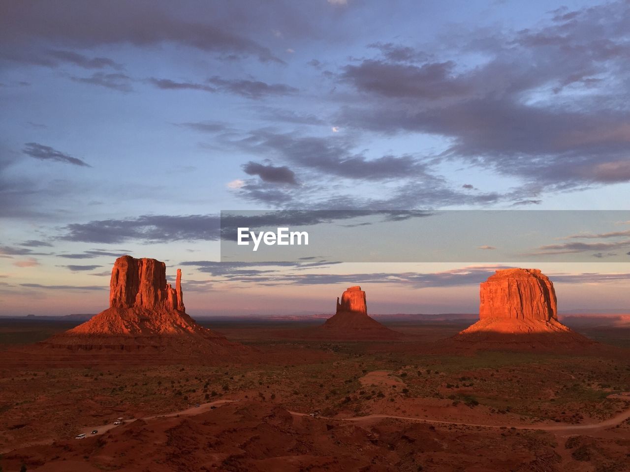 Idyllic shot of monument valley against sky during sunset
