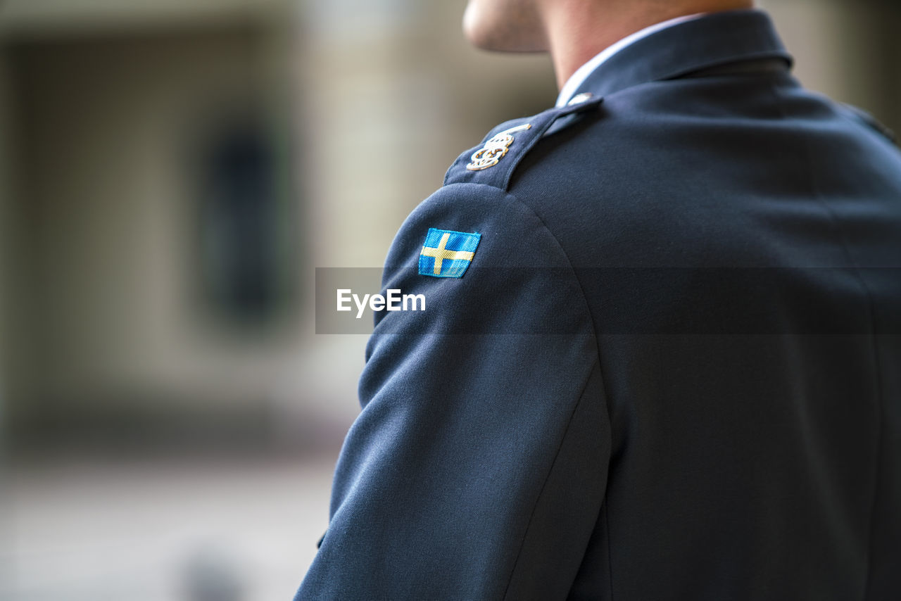 Swedish flag guards at the court of the royal palace in stockholm