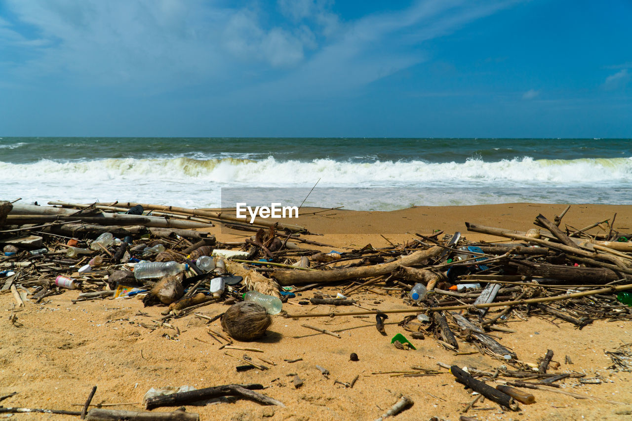 Sea coast after the storm. environmental nature waste. negombo, sri lanka.