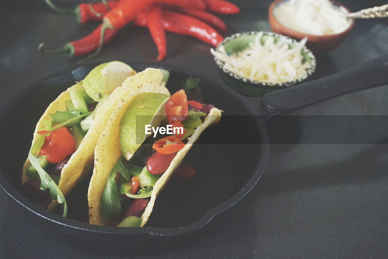 High angle view of salad in pan on table