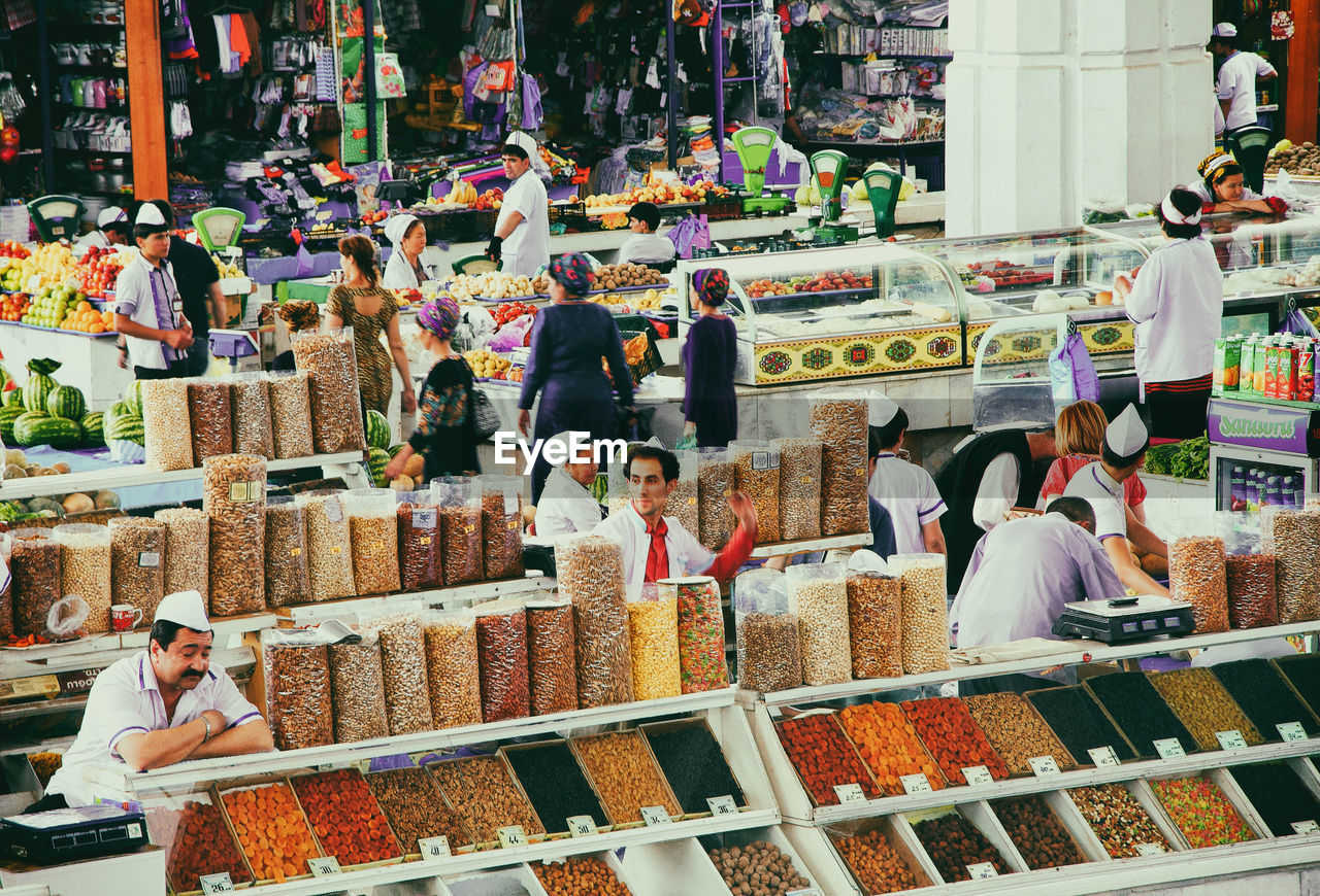 GROUP OF PEOPLE FOR SALE AT MARKET