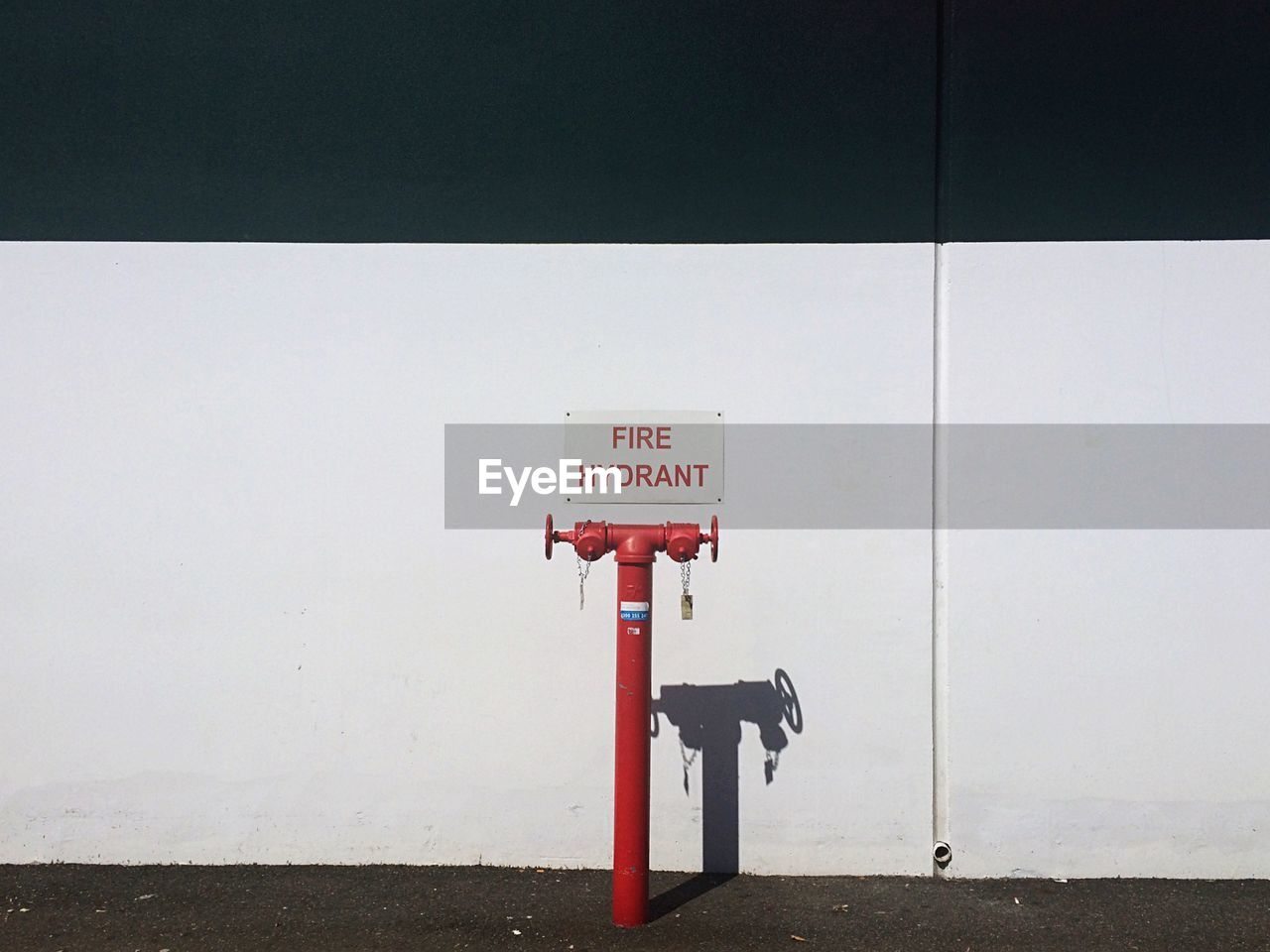 Red fire hydrant on roadside