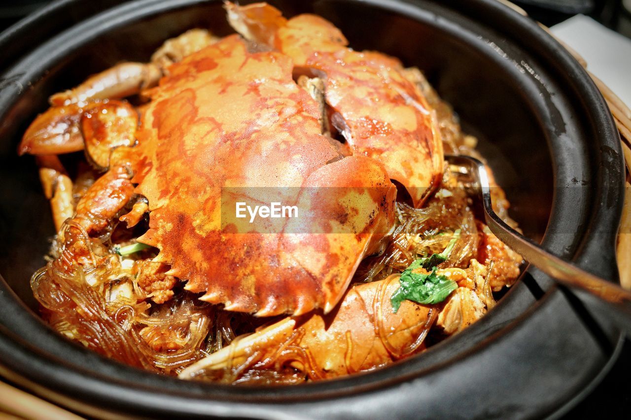 High angle view of meat in cooking pan