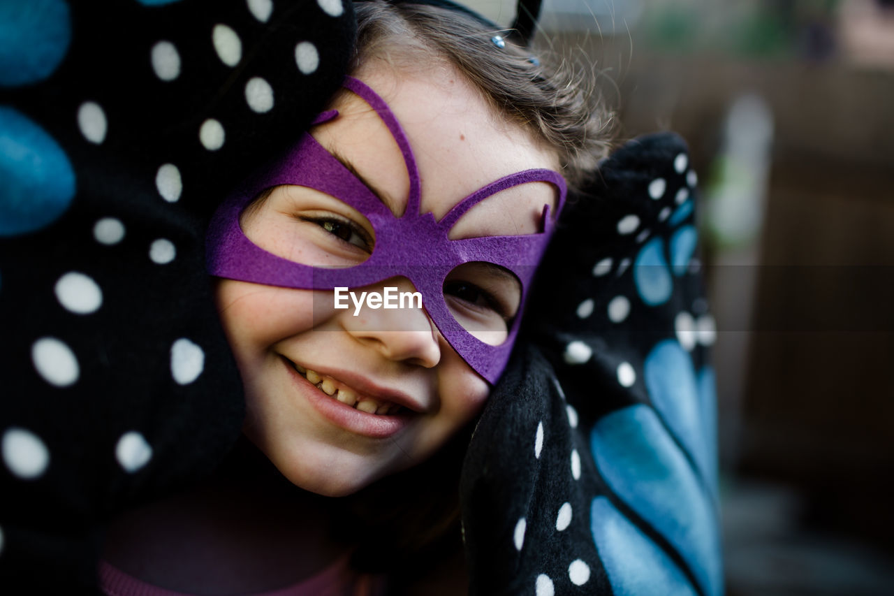 Close up of young girl in dress up