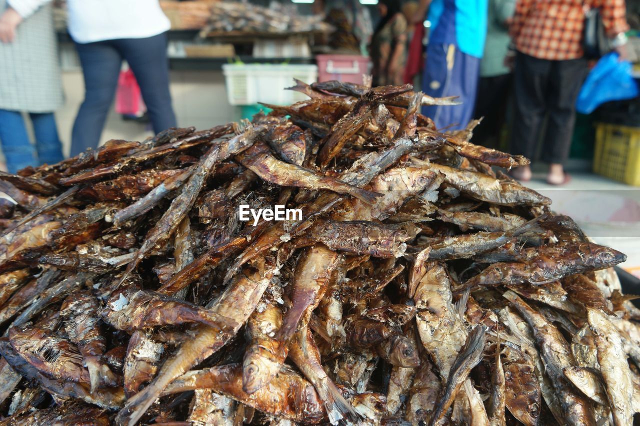 Close-up of salted fish for sale in market