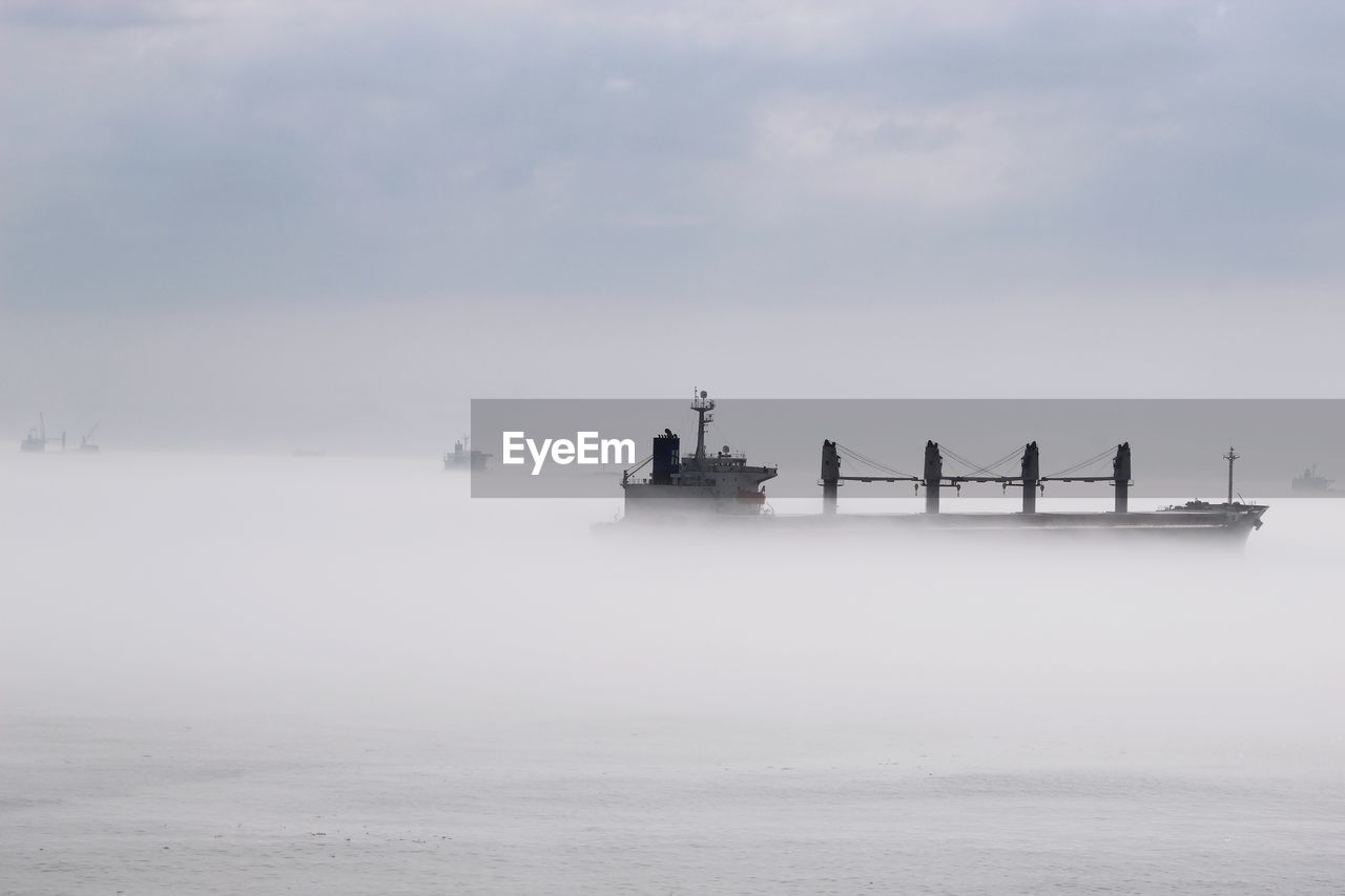 Boat in sea against sky