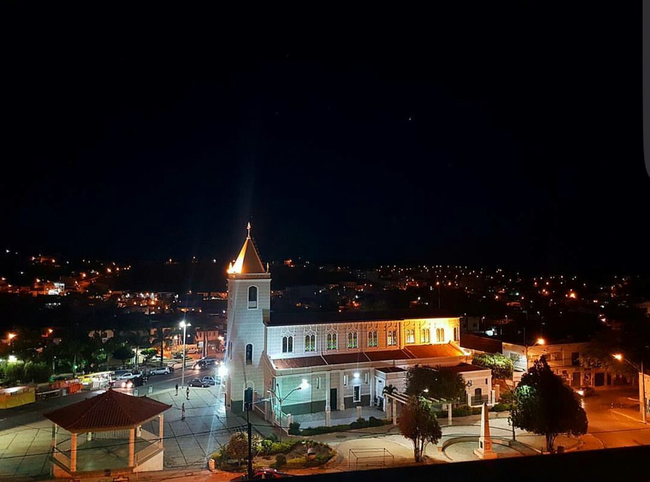 ILLUMINATED CITY AT NIGHT