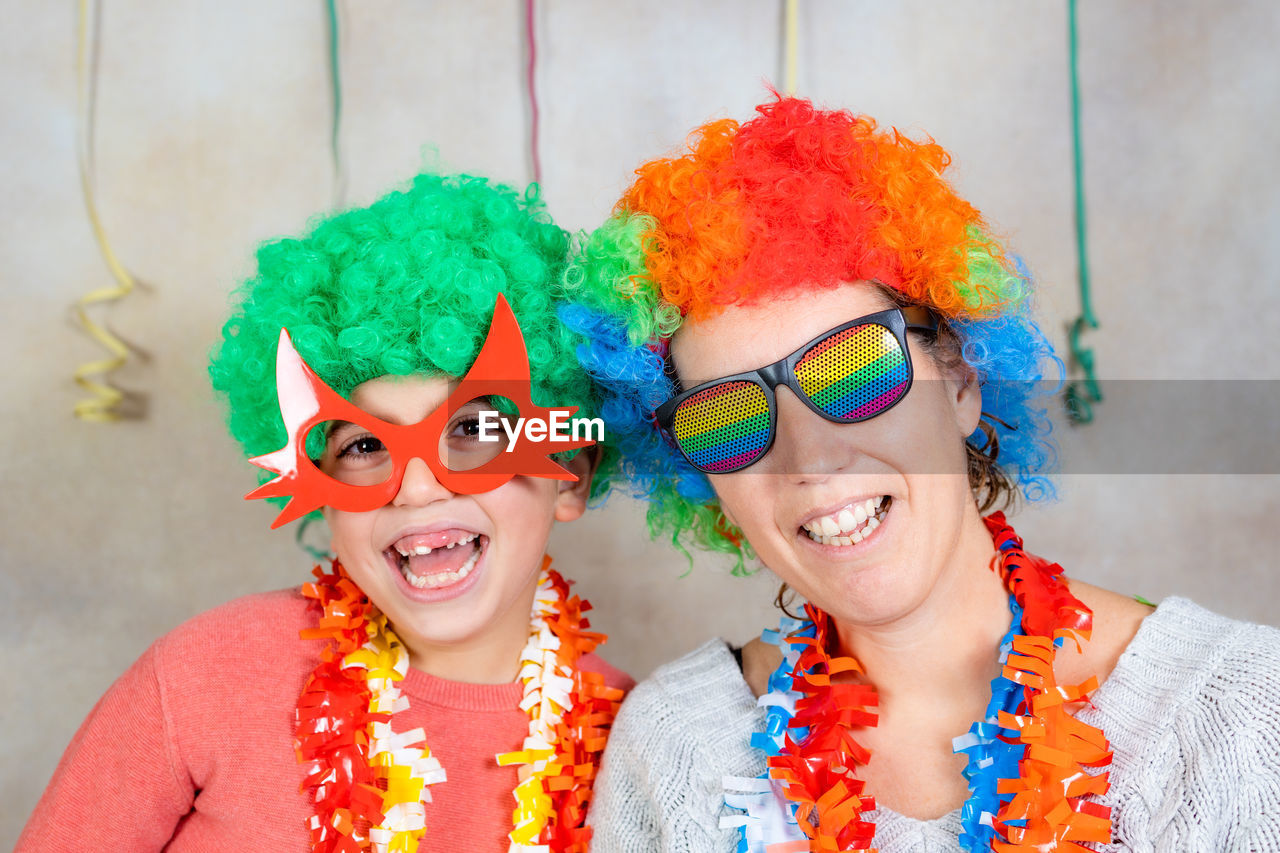 Mother and son celebrating carnival at home
