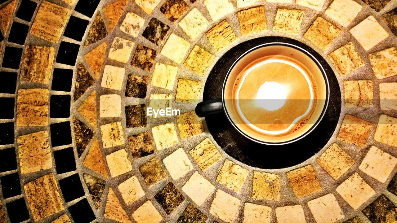 HIGH ANGLE VIEW OF COFFEE ON FLOOR