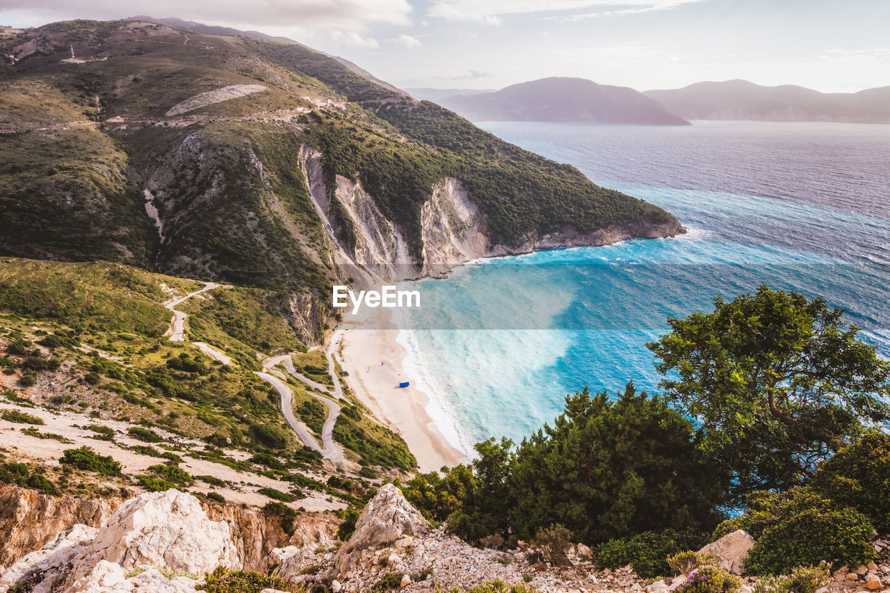 Sea and mountains against sky