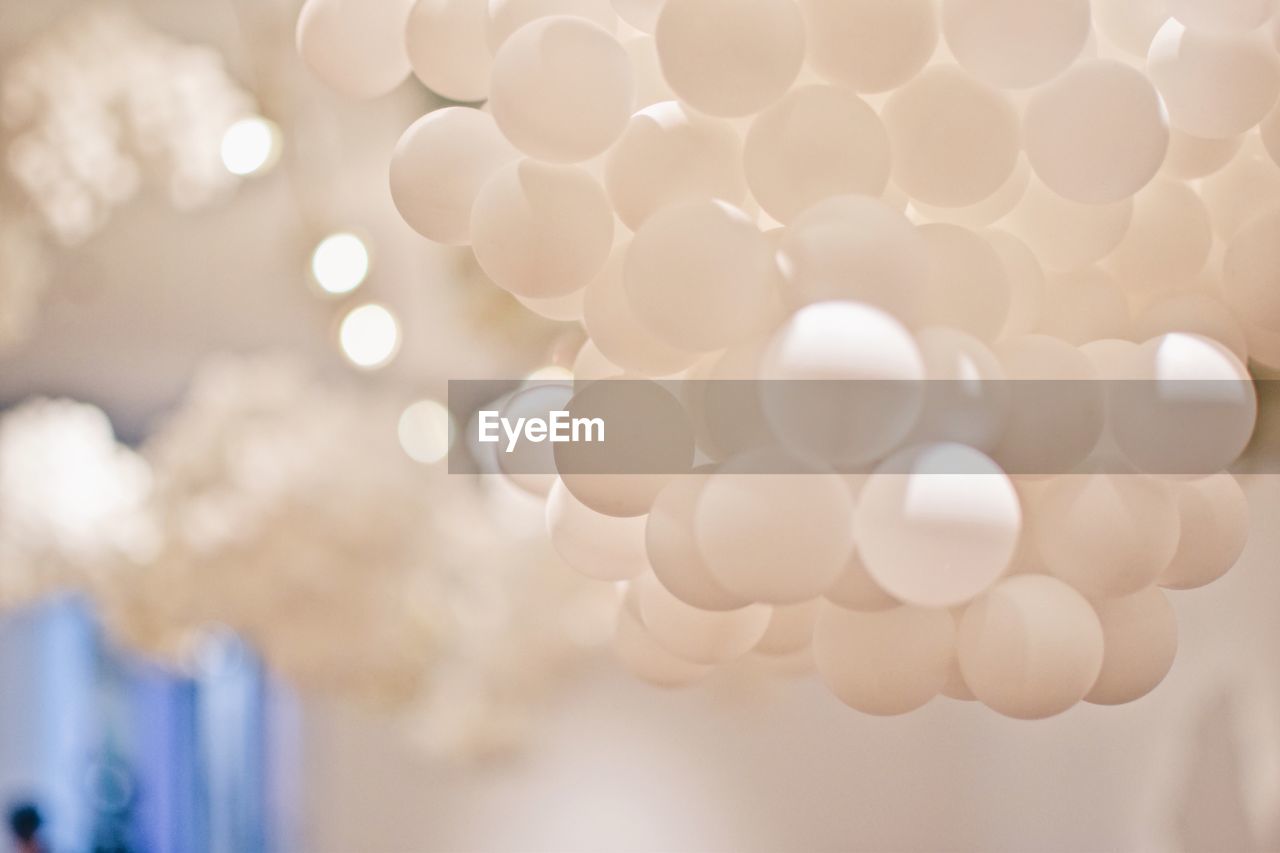 Close-up of white helium balloons
