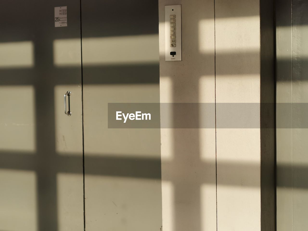 white, wall, no people, indoors, security, interior design, protection, full frame, architecture, closed, door, line, pattern, building, entrance, furniture, wall - building feature, built structure, close-up, backgrounds, metal, window covering, light, lock, day, shadow