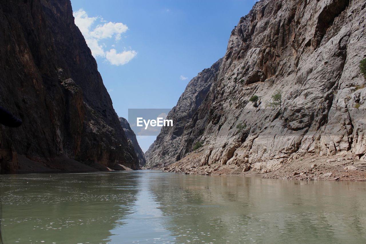 Scenic view of mountains against sky in canyon 